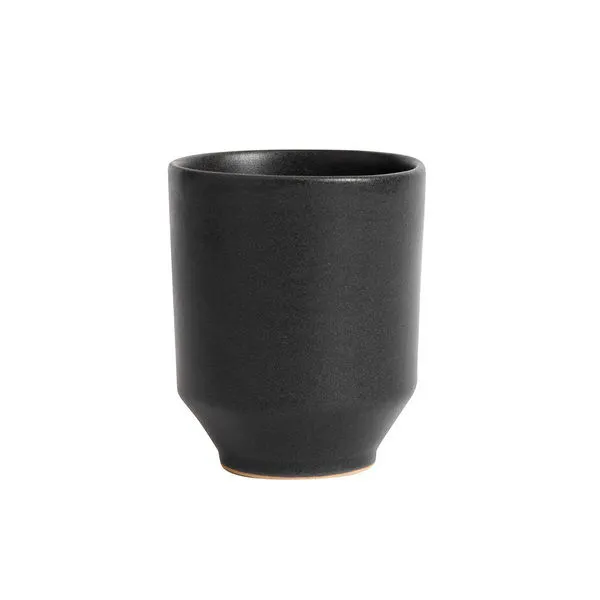 Black ceramic Ceto Cup with matte finish and subtle texture, tapered at base with natural tonal variation