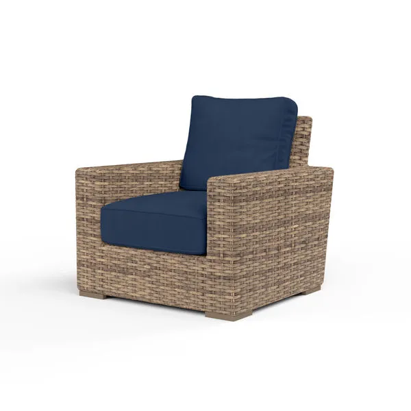 Havana Club Chair with rich Aged Tobacco all-weather wicker and navy blue cushions