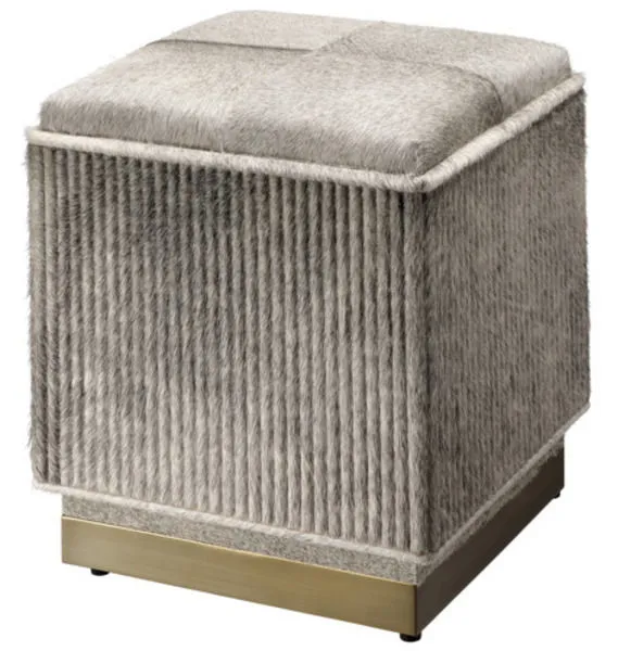 Back and side view highlighting square shape, ribbed sides, piped edges, and antique brass base of the ottoman