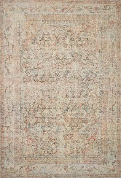 Traditional style rug with vintage-inspired apricot and natural tones featuring intricate faded floral and geometric motifs