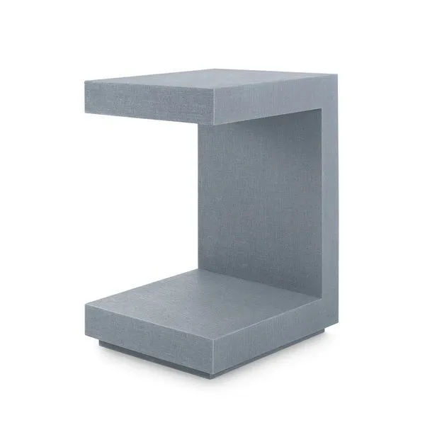 Cubist silhouette Essential Side Table in a soft blue lacquered linen finish with angular cutout design