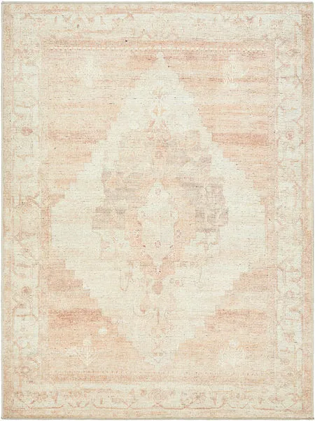 Luca Dusty Pink Machine Woven Rug with a traditional medallion design in faded dusty pink and cream tones.