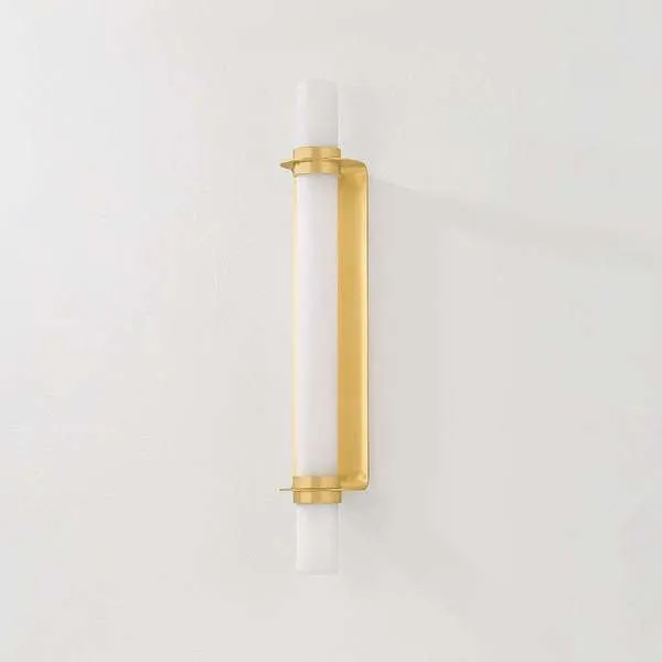 Side view of Groveland Station sconce highlighting metal backplate curvature