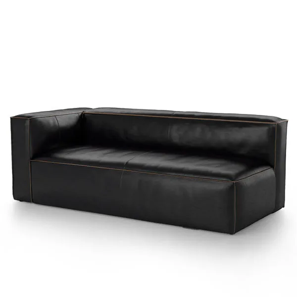 Sleek black leather left-arm facing sofa sectional with contrast brown stitching and clean Italian design