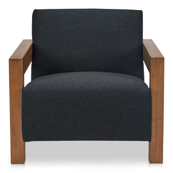 Harriet accent chair with dark woven upholstery and broad wood armrests featuring a modern transitional design