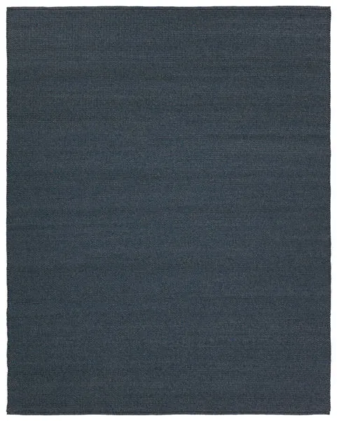 Handwoven solid deep blue indoor/outdoor rug with natural-inspired texture, 9 by 12 feet