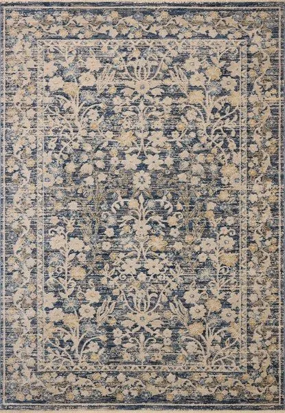 Traditional power-loomed area rug with intricate floral pattern in blue and beige tones