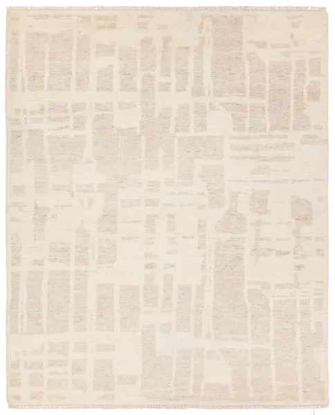 Handknotted rug with Moroccan-inspired abstract motif in cream, taupe, and beige with short cream fringe