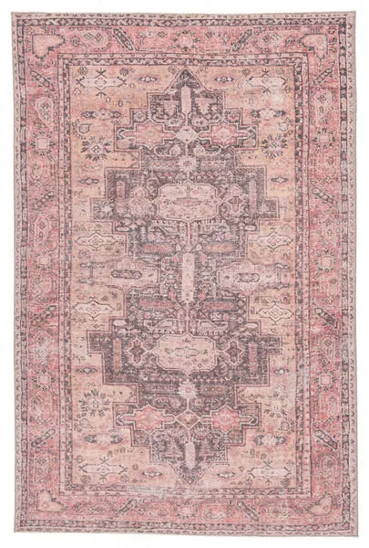 Full front view of the rectangle rug highlighting the central tribal medallion and floral border design