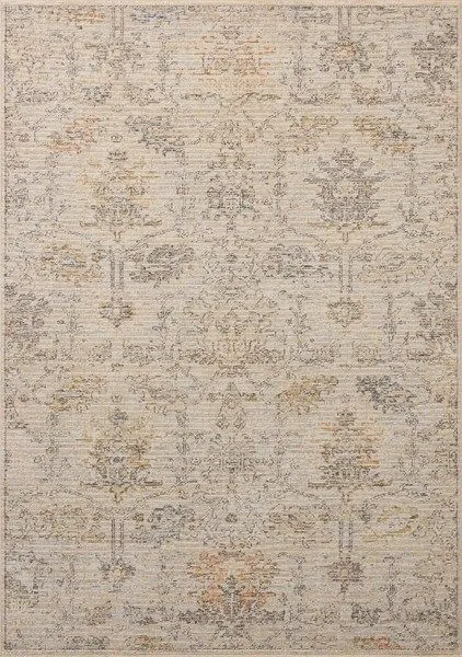 Vintage style Milena Ivory / Granite rug with neutral grey and beige floral motifs on a textured pile