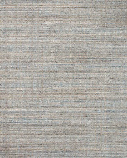 Jamie Natural / Sky Rug with hand-loomed jute and polyester fibers in soft sky blue and natural tones with subtle abrash c...