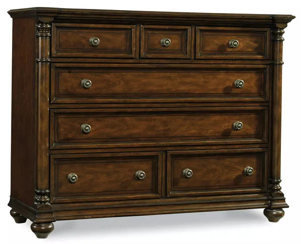 Leesburg Bureau in rich brown wood, seven drawers with traditional round knobs and decorative columns