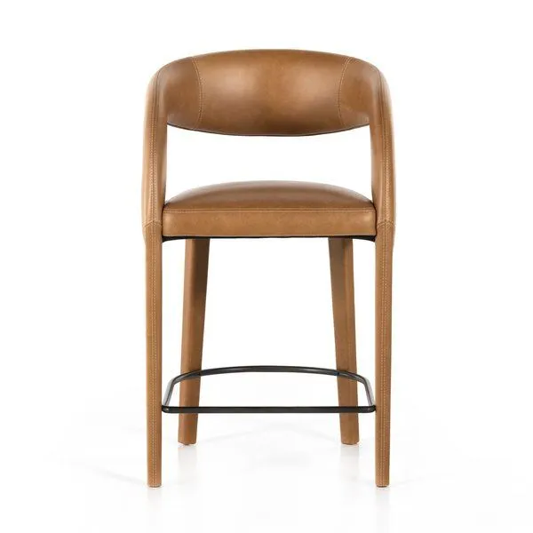 Hawkins Bar + Counter Stool with curved back, butterscotch top-grain leather seat and black metal footrest