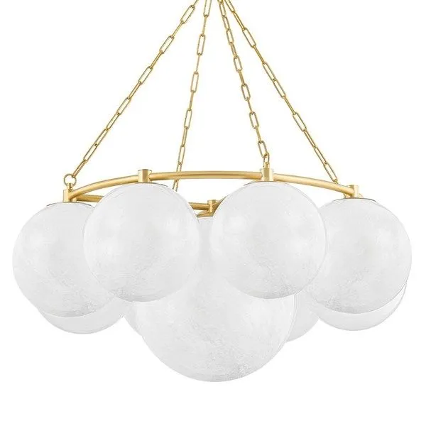 Large chandelier with nine cloud glass globes arranged around a bigger center globe and aged brass frame and chain