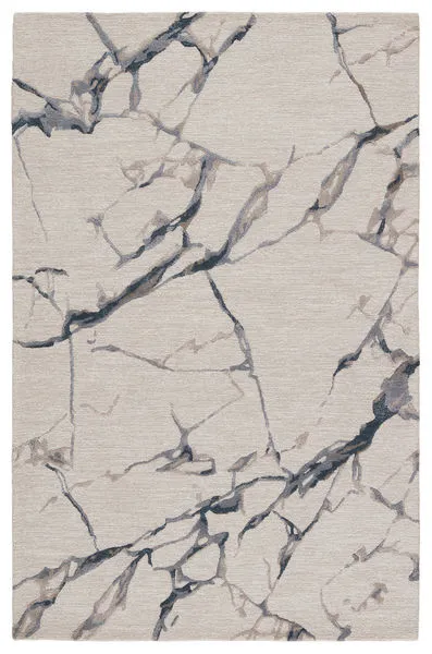 Hand-tufted abstract rug in light gray with fractured design in taupe and blue hues