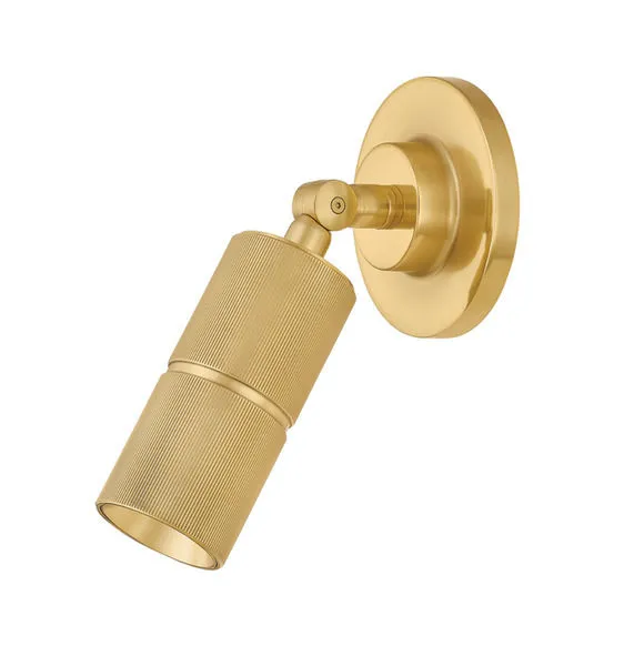 Studio shot of Truett Wall Sconce isolated on white background with cylinder light angled downward