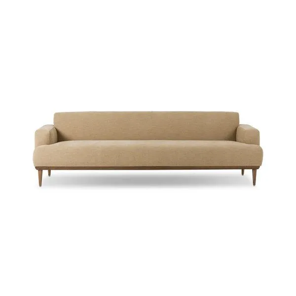 Ethel Sofa in light tan poly-linen fabric with rounded wood base, tapered legs, classic track arms, and fixed back cushion