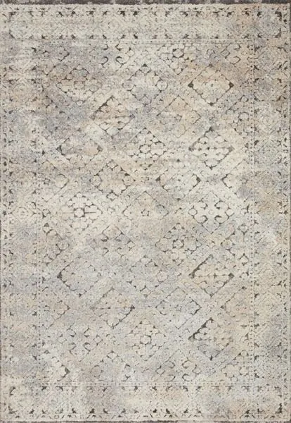 Overhead view revealing full geometric and floral pattern with distressed effect in grey and sand colors