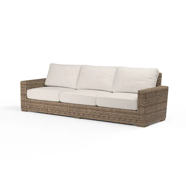 Havana Sofa with all-weather wicker in Weathered Tobacco Leaf and beige cushions