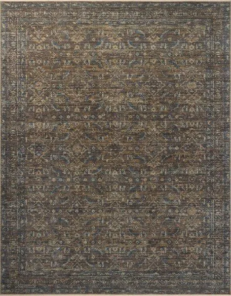 Traditional tobacco-colored vintage style rug with intricate muted blue and brown motifs and variable-pile texture