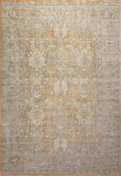 Rectangular traditional rug in gold and sand tones with vintage-inspired intricate medallion pattern