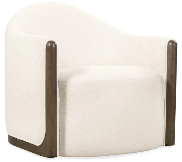 Cora Swivel Chair with rounded back, ivory fabric upholstery, and dark wood trim on sides and base