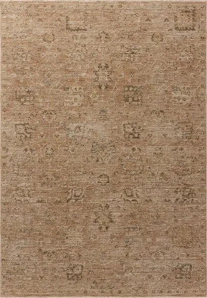 Willa Clay multi rug with faded traditional Turkish motifs in sand and pale sky tones, vintage-style design