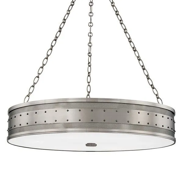 Gaines 6 Light Pendant with a round steel frame, perforated texture and rivet details, suspended by three chains