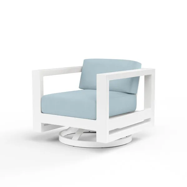 Outdoor swivel club chair with low back, powder coated white aluminum frame, and light blue cushions