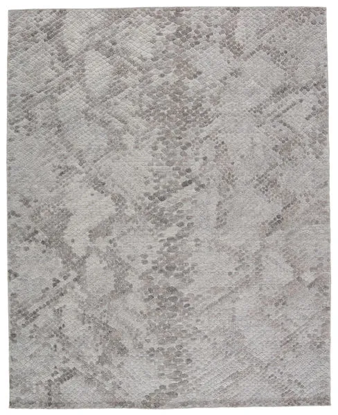 Gray and taupe handmade rug with textured geometric pattern and tonal color variation