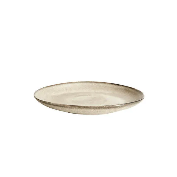 Mame Dessert Plate with a soft beige speckled glaze and slightly irregular rounded edges