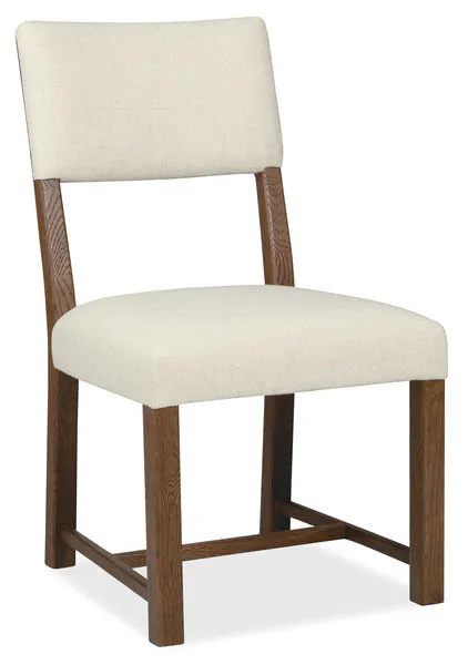 Driftwood Upholstered Side Chair with warm brown wood frame and cream fabric seat and backrest