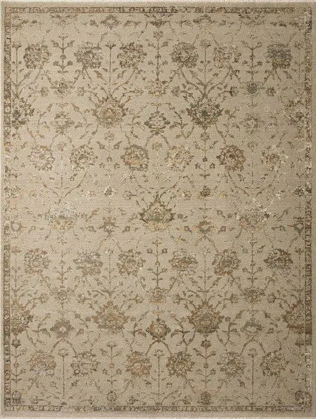 Silver sage rug with muted floral and vine motifs in beige, grey, and brown tones with a subtle decorative border
