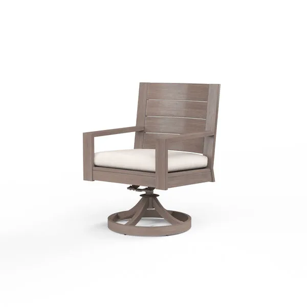 Outdoor Laguna Swivel Dining Chair with hand-brushed driftwood finish aluminum frame and off-white cushioned seat