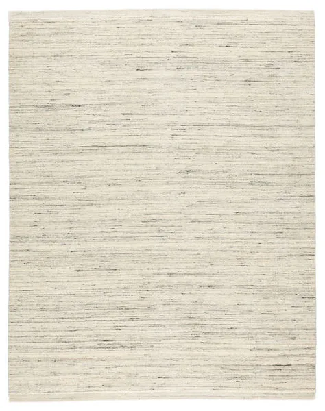 Tallwood handmade solid area rug in cream with light blue and neutral gray heathered wool texture