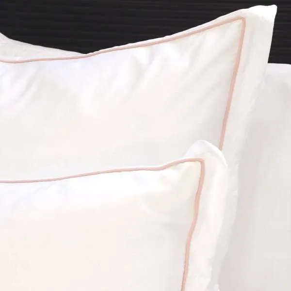 Soft pink Sheena Bamboo Sateen Euro Sham with subtle piping detail on crisp fabric