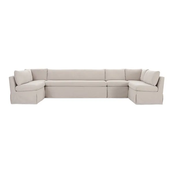 U-shaped Fable slipcover dining banquette in light beige with inverted pleats and removable cushions