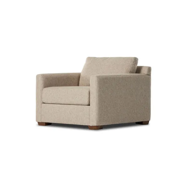 Hampton chair and a half in delta sand fabric with plush cushions and block wooden feet