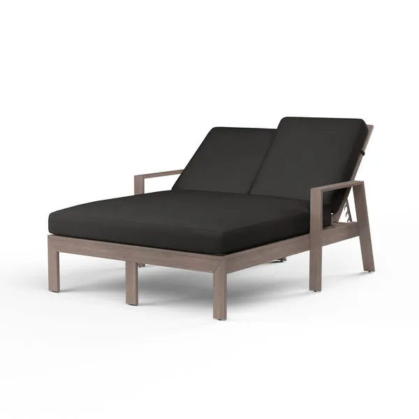 Laguna Double Chaise Lounge with hand-brushed driftwood look aluminum frame and dark gray cushions