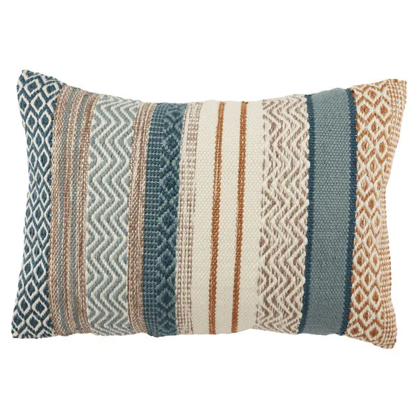 Lumbar pillow with geometric tribal pattern in blue, gold, and cream with textured boucle fabric and stripes