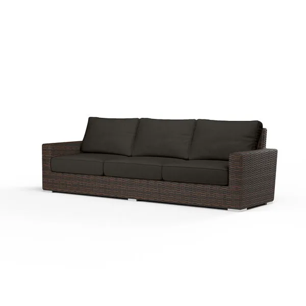 Montecito Sofa with cognac multi-colored resin wicker frame and dark brown seat and back cushions