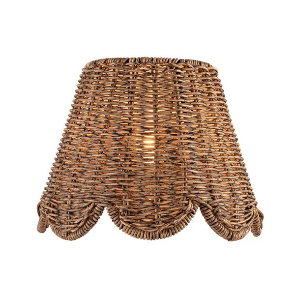 Kismet Polished Nickel Sconce featuring a woven rattan-like shade with scalloped edges, emitting warm light