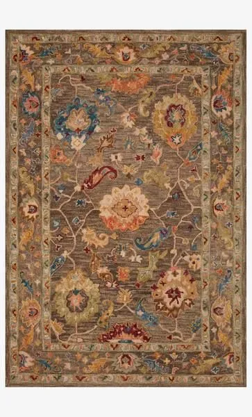 Padma Charcoal Multi Rug with thick wool pile, featuring bold floral motifs in blue, yellow, red, and beige on a charcoal ...