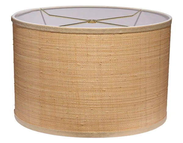 Drum lampshade made of natural raffia with linen trim and brass harp, cylindrical shape in light tan color