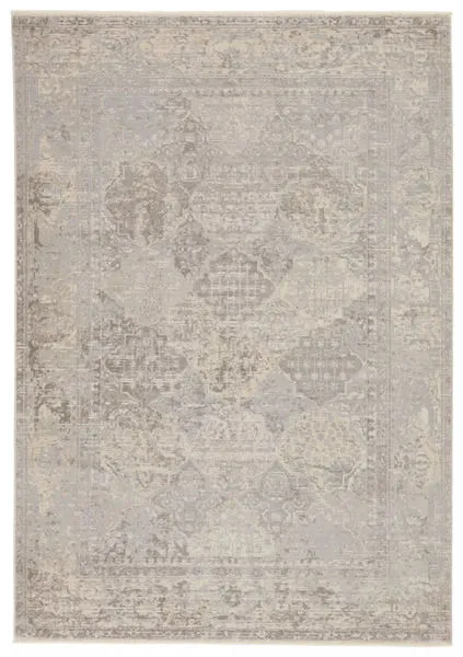 Lourdes Trellis rug in gray, taupe, and cream featuring distressed mosaic pattern with metallic gold and silver accents