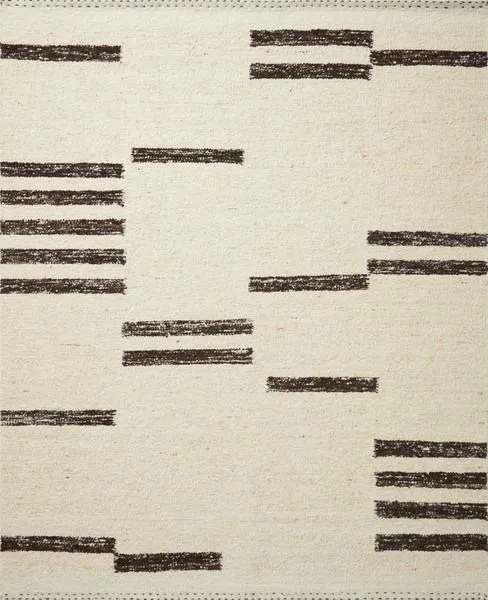 Neutral Roman Natural / Bark rug with black irregular horizontal stroke patterns and stitched edges