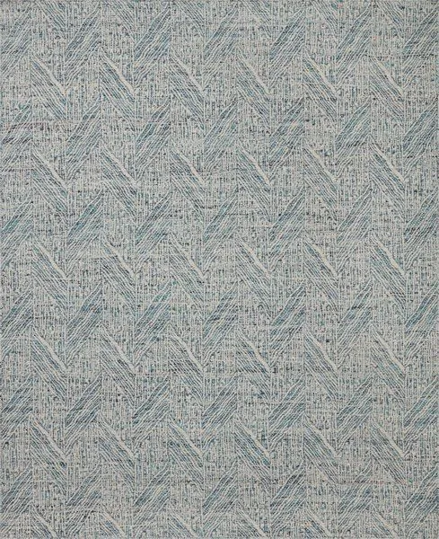 Raven Blue / Ivory Rug with layered geometric chevron pattern in soft blue and ivory tones, handwoven texture