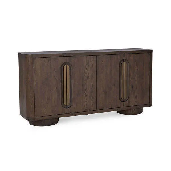 Modern wood buffet with dark oak veneer, cylindrical wide feet, and bold brass oval door pulls