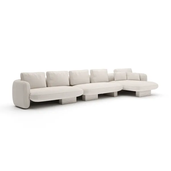 Ivory Overlap Right Chaise Sectional with rounded cushions and travertine-inspired block base