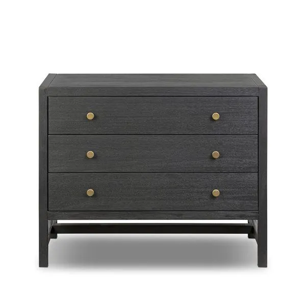 Sullivan Nightstand with three black acacia veneer drawers and brass-finished knurled knobs on a raised open base
